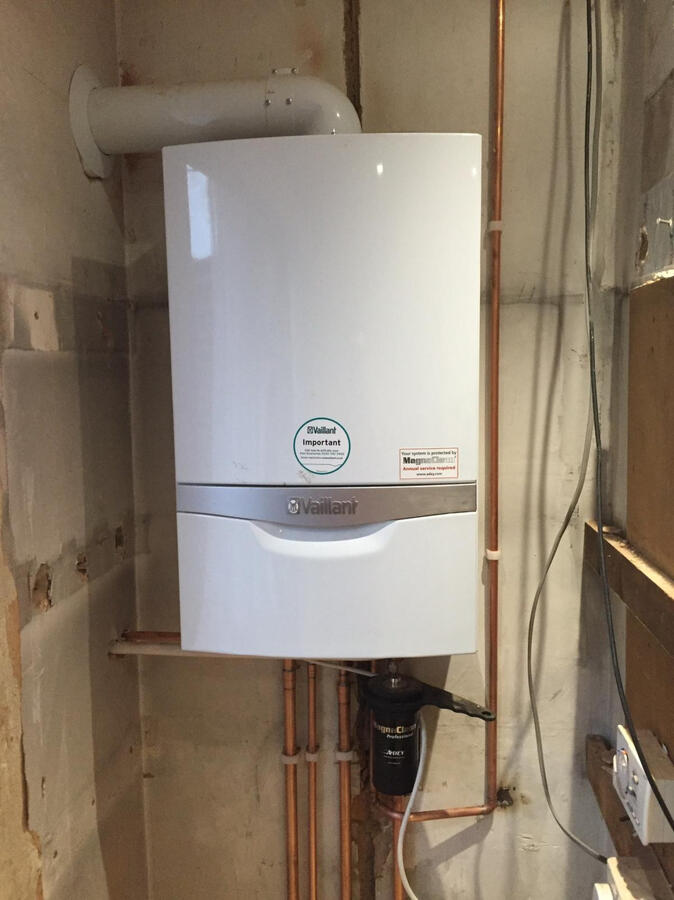 Modern boiler unit with organized piping layout