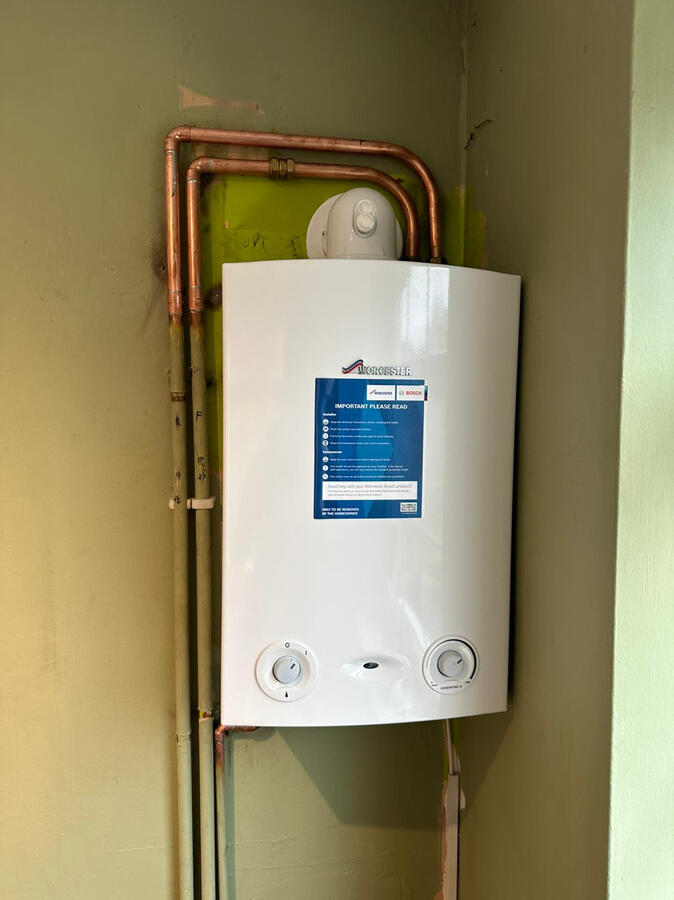 Gas Safe certified boiler setup with clean piping